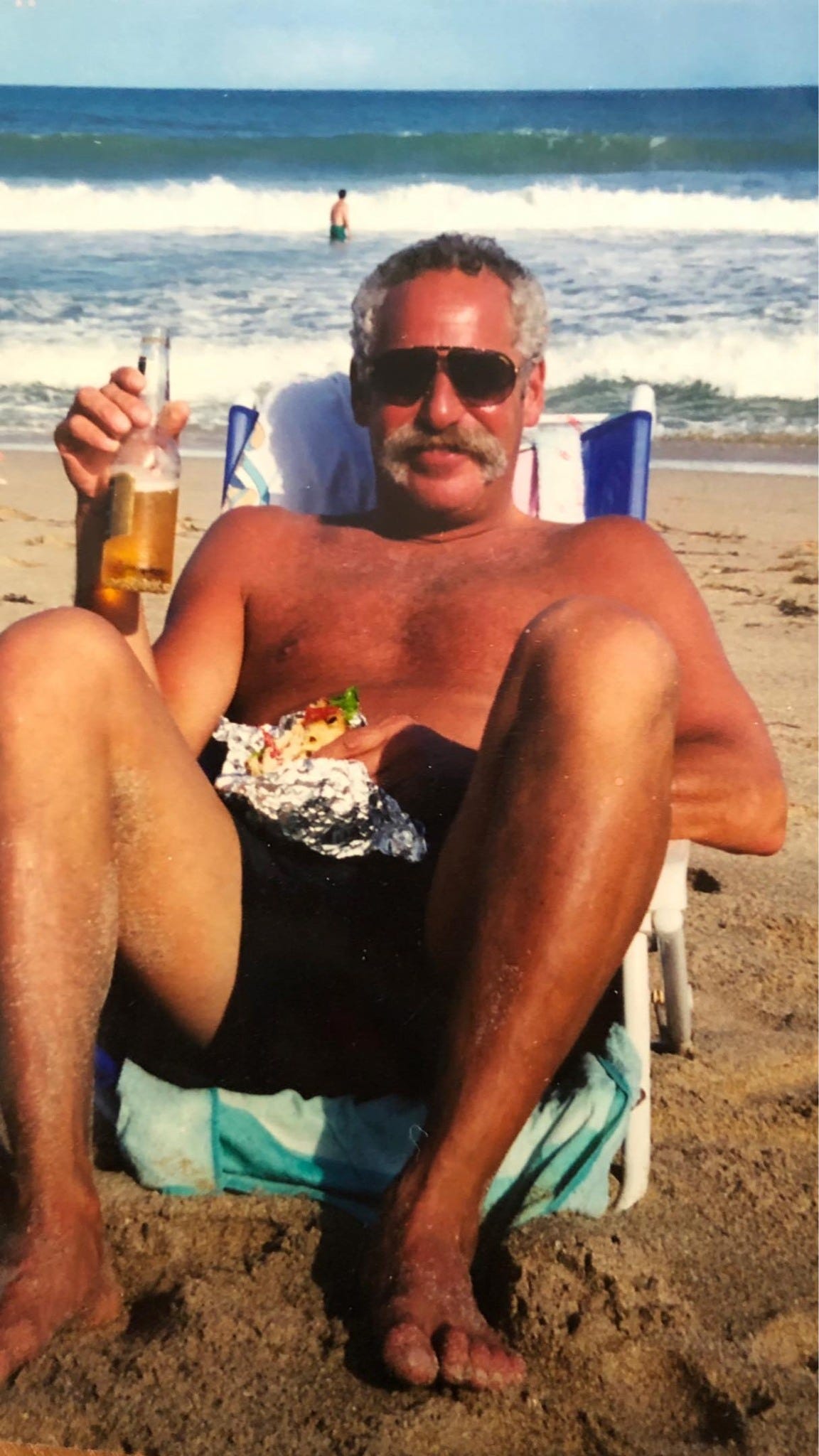 May be an image of 2 people, beach and ocean